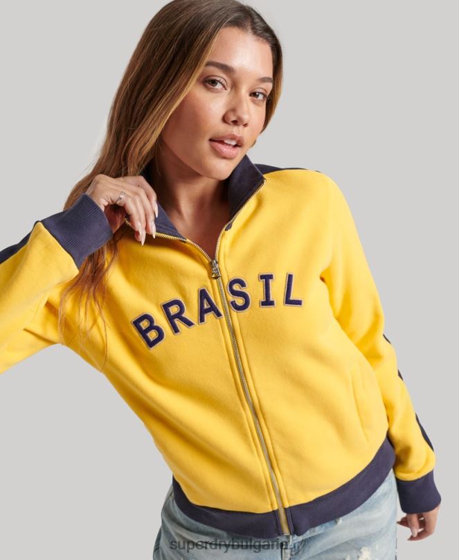 Superdry x Ringspun облекло N00H3304 жълто Жени топ на футболната бразилска писта