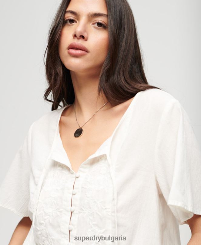 Superdry облекло N00H2078 сметана Жени горнище с бродирани копчета с къс ръкав