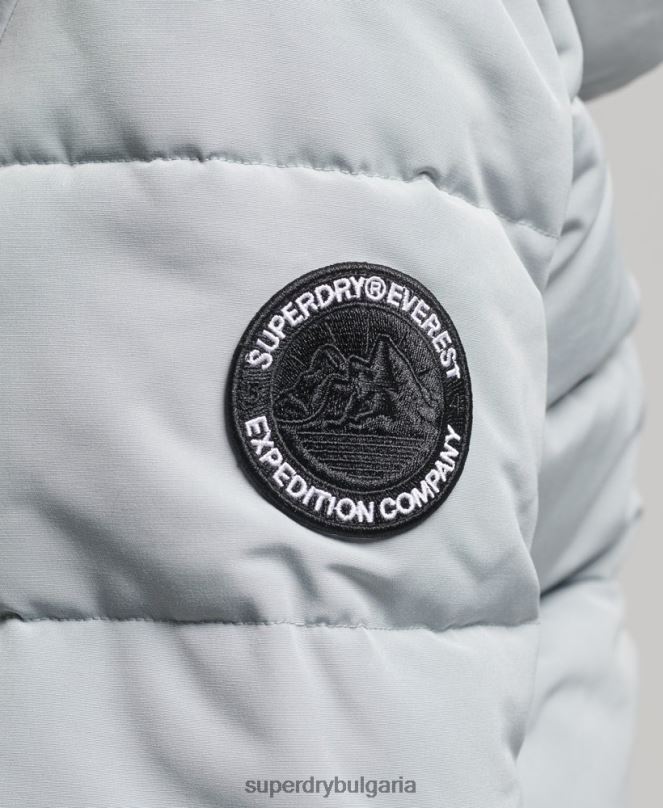 Superdry облекло N00H3736 светло синьо Жени яке Everest с качулка и пуфър