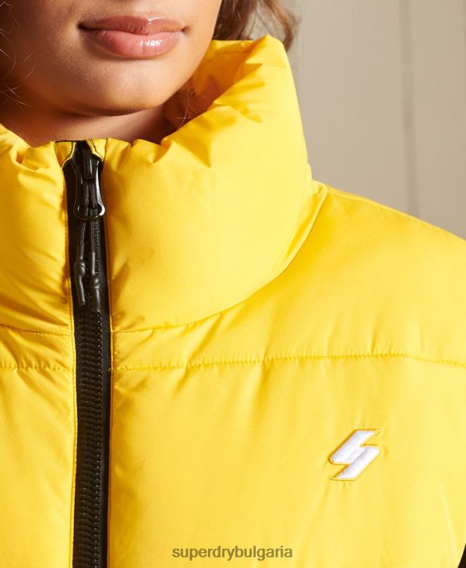 Superdry облекло N00H5565 жълто Жени спортен пуф голям жилет
