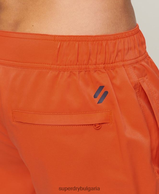 Superdry облекло N00H13 оранжево мъже спортно облекло рециклирани шорти