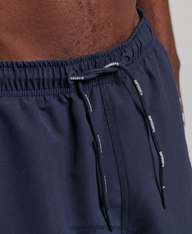 Superdry облекло N00H409 военноморски флот мъже 19-инчови рециклирани бански шорти с апликация