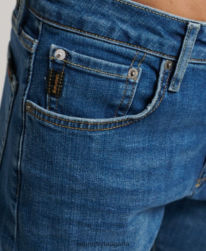 Superdry облекло N00H1220 светло синьо мъже тънки дънки от органичен памук