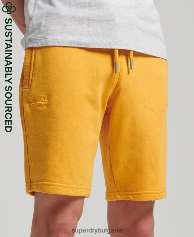 Superdry облекло N00H363 жълто мъже къси панталони от трико с ретро лого от органичен памук