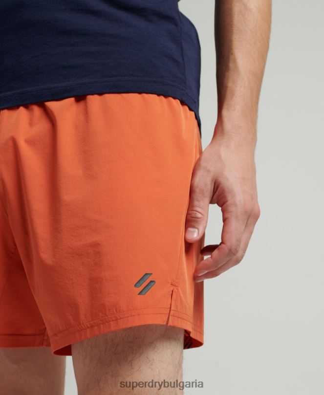 Superdry облекло N00H5359 оранжево мъже бягайте първокласни шорти