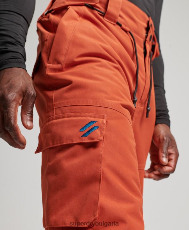 Superdry облекло N00H1378 оранжево мъже ски ultimate спасителни панталони
