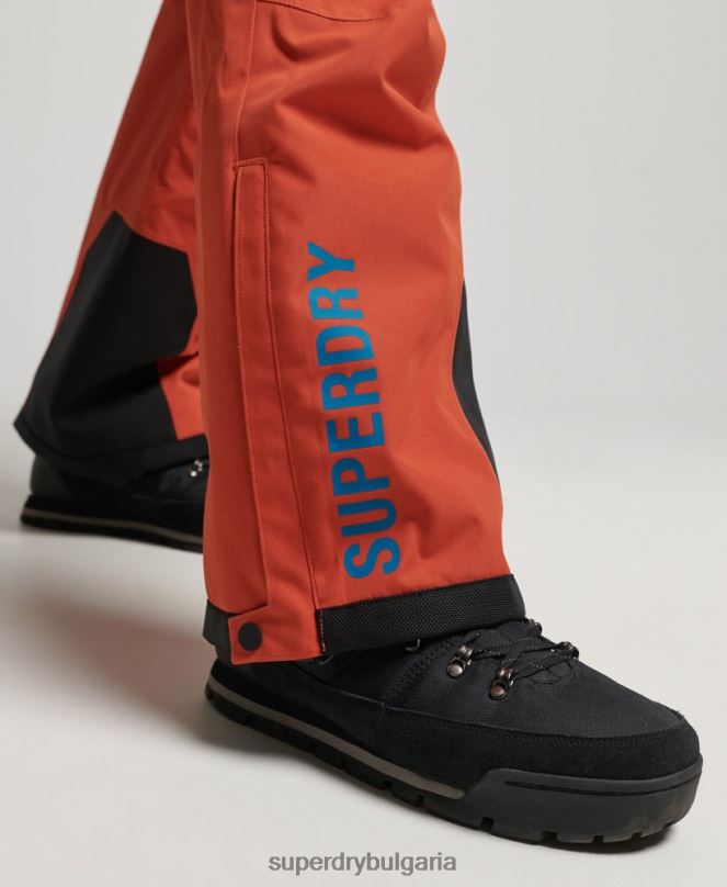 Superdry облекло N00H1378 оранжево мъже ски ultimate спасителни панталони