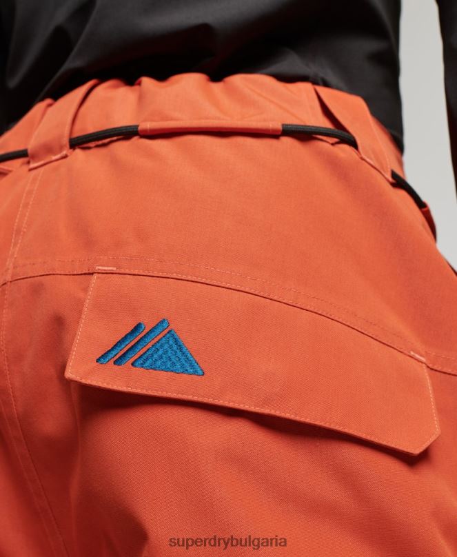 Superdry облекло N00H1378 оранжево мъже ски ultimate спасителни панталони